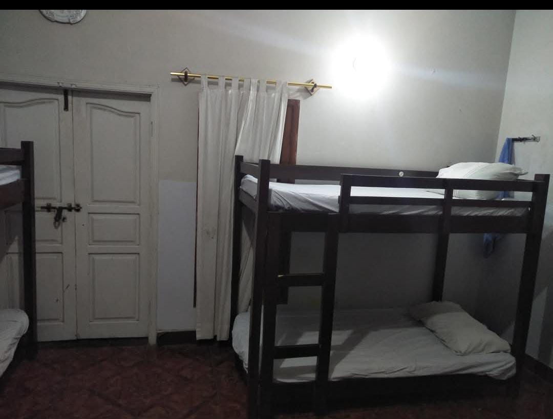 Room 1 at TSR Hostel — 4 Seater, Boys hostel with AC, Bath, Furnished, Beds/Mattresses, Cupboards, Karachi, Pakistan